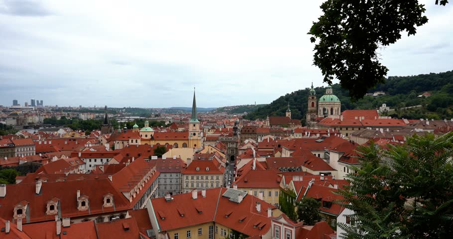 Prague city skyline with red residential building rooftops, Czechia