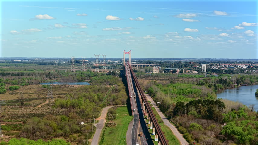 Aerial Establishing View of Route 12 Traffic Crossing Zárate Brazo Largo Bridge in Argentina