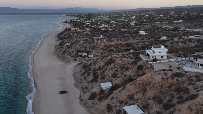 Aerial view of beachfront homes at Ensenada de los Muertos, Mexico.