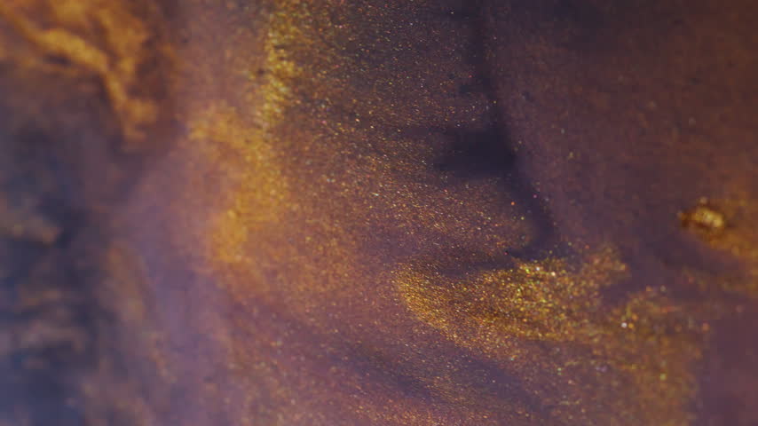 Pigment spill. Color stream. Defocused yellow blue neon bright paint liquid particles sparkling splash floating on abstract background.