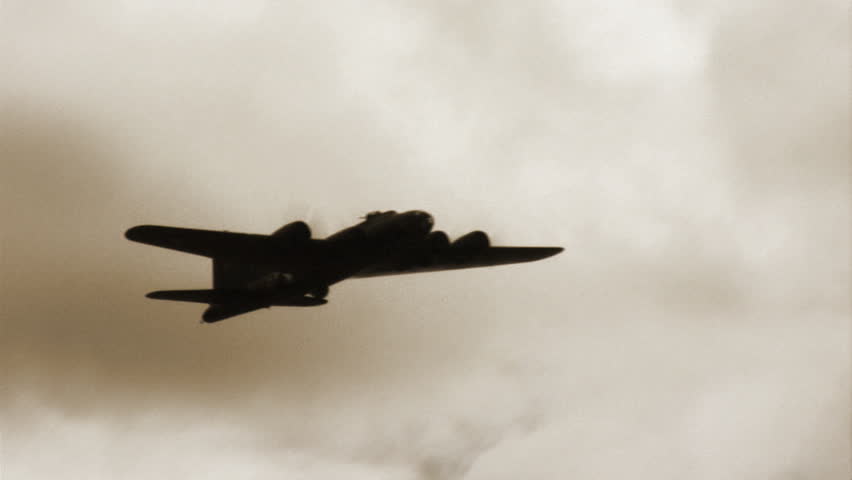 Footage of a vintage WWII bomber tinted and processed with various filters to