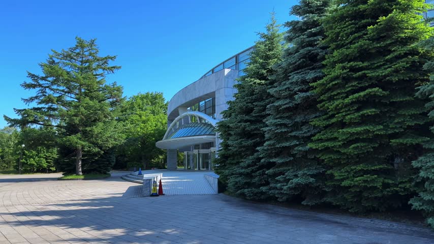 Modern Cultural Building Surrounded by Green Parkland in Sapporo