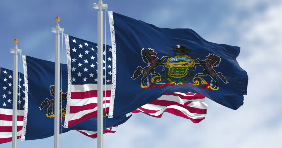 Pennsylvania state flag waving with the american flag. Blue field with state coat of arms: shield between horses, eagle on top. Seamless 3d render animation. Slow motion loop. Selective focus