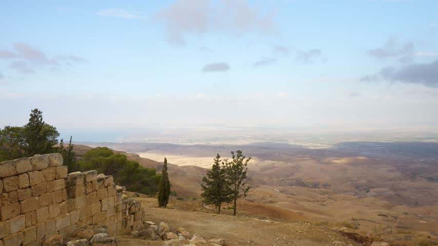Panoramic Video of The Biblical Holy Land Landscape Viewed From Mount Nebo in Jordan, Showcasing The Vast Jordan Valley and Arid Landscape.