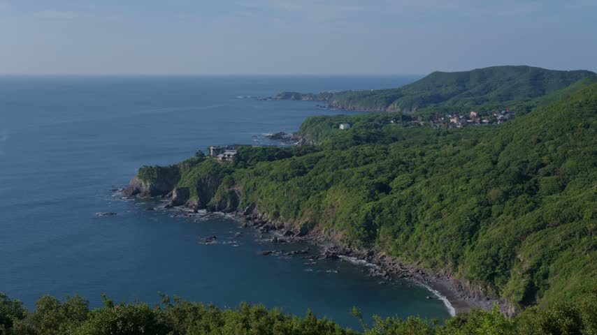Aerial View of Coastal Cliffs and Ocean Shoreline in Toba City, Mie Prefecture, Japan