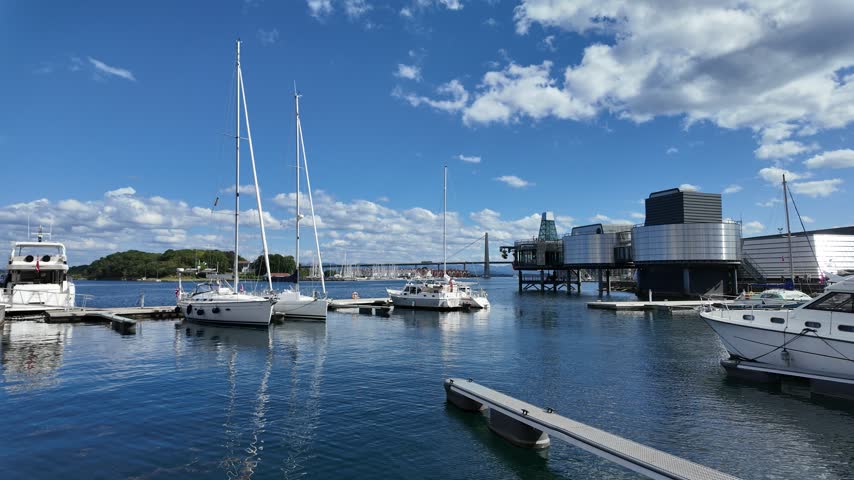 Looking across the water towards the Norwegian Petroleum Museum in the heart of central Stavanger. The Stavanger City Bridge is visible in the background.