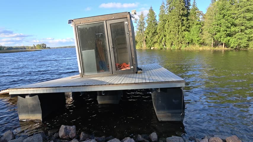 a dock next to a body of water.