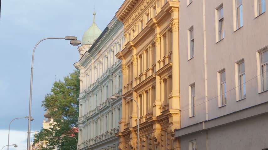 View of historic buildings with ornate facades and street lamps in Olomouc, Olomouc Region, Czechia.