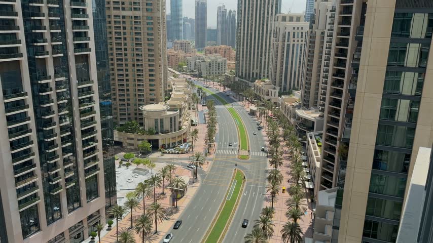Top-down view of urban traffic and roads in Downtown Dubai, UAE.