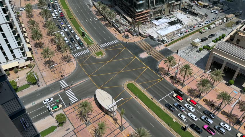 Top-down view of urban traffic and roads in Downtown Dubai, UAE.