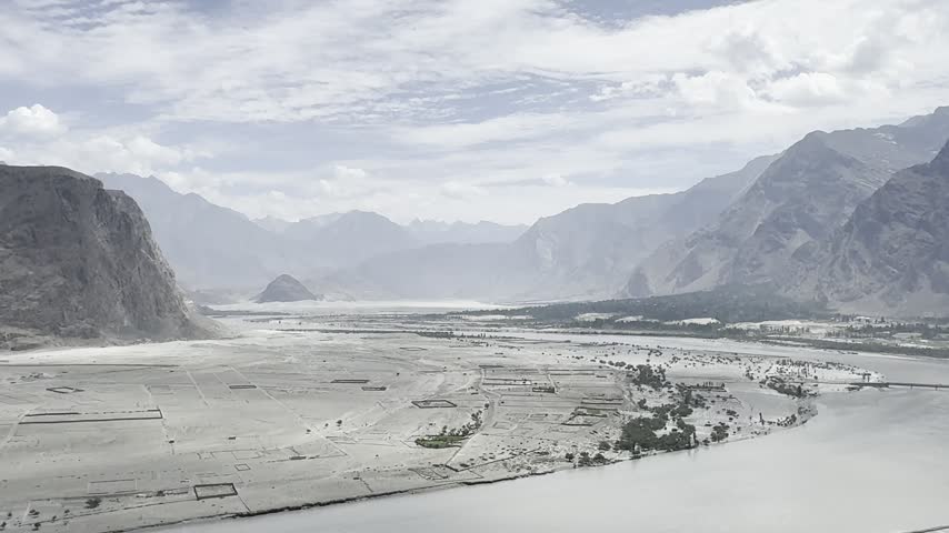Indus River crosses a broad valley beside Skardu beneath towering mountains, Gilgit-Baltistan, Pakistan