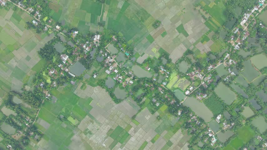 Aerial view of rural farmland with scattered houses