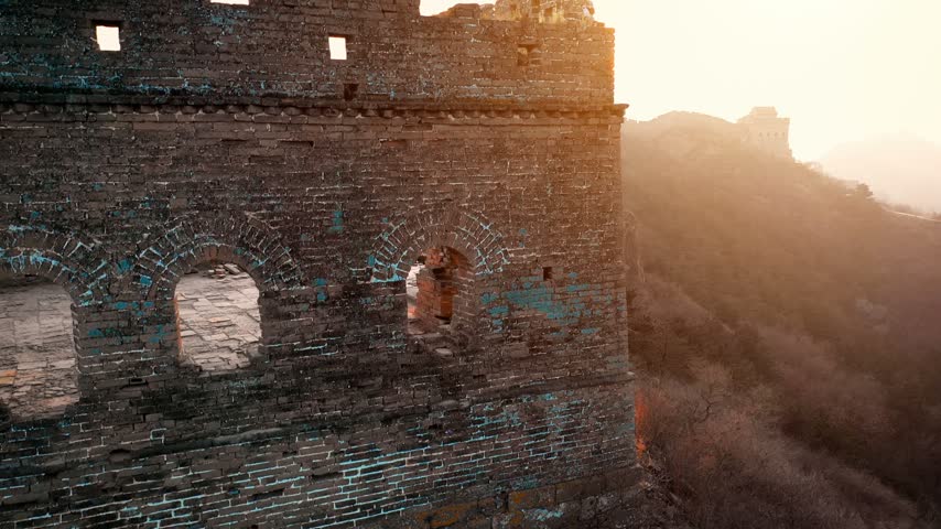 Flying over the Great Wall of China at sunset