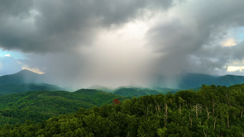 Nature landscape of Tennessee Appalachian mountains. Mountain forest with green canopies in summer rain season.
