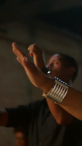 Senior female believer praying fervently with closed eyes during an emotional gospel church service expressing heartfelt adoration, divine peace, and quiet piety