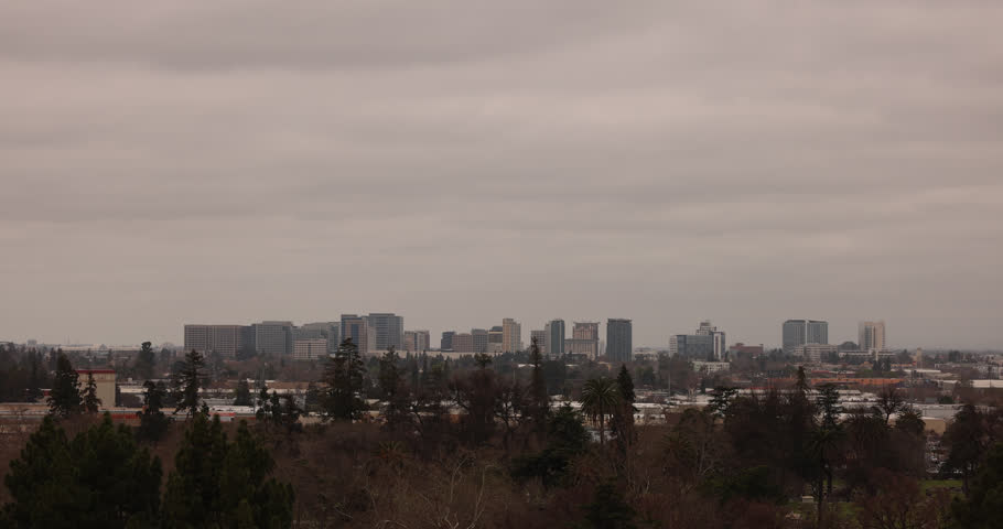 A winter storm passes over the downtown skyline of San Jose, California, USA.