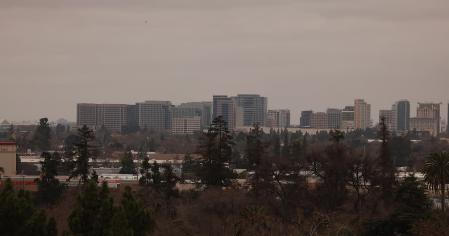 A winter storm passes over the downtown skyline of San Jose, California, USA.