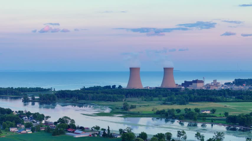 Enrico Fermi II nuclear power plant emitting vapor from its cooling towers in Berlin Township, Michigan, USA