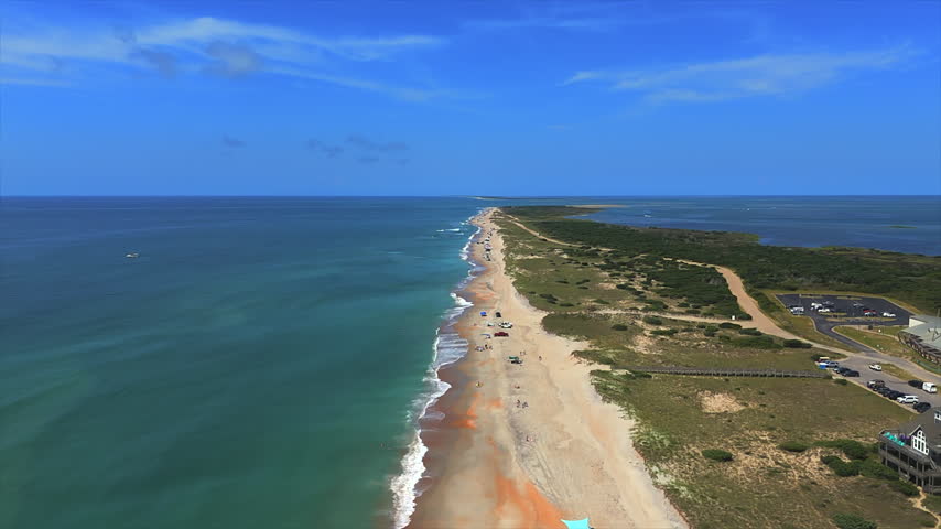 Aerial view of Hatteras Island within Cape Hatteras National Seashore in the Outer Banks of North Carolina, USA, showing the coastal landscape, sandy shoreline and surrounding Atlantic Ocean