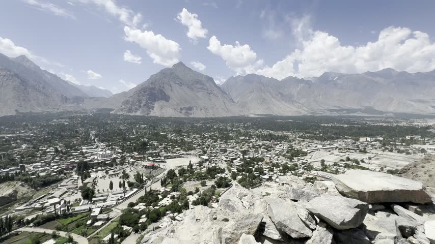 Skardu fills a broad green valley surrounded by towering barren mountains, Gilgit-Baltistan, Pakistan