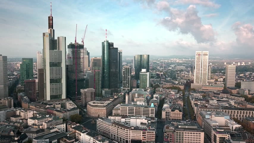 Aerial drone footage of the city center, business district and the banks in Frankfurt am Main in Germany in the European Union. Frankfurt is the financial and banking capital of Germany and Europe.
