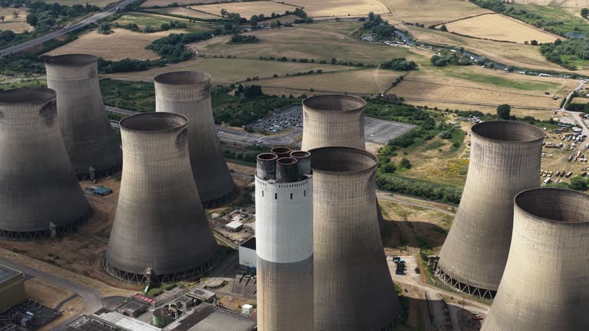 Cooling towers generating electricity at industrial power plant
