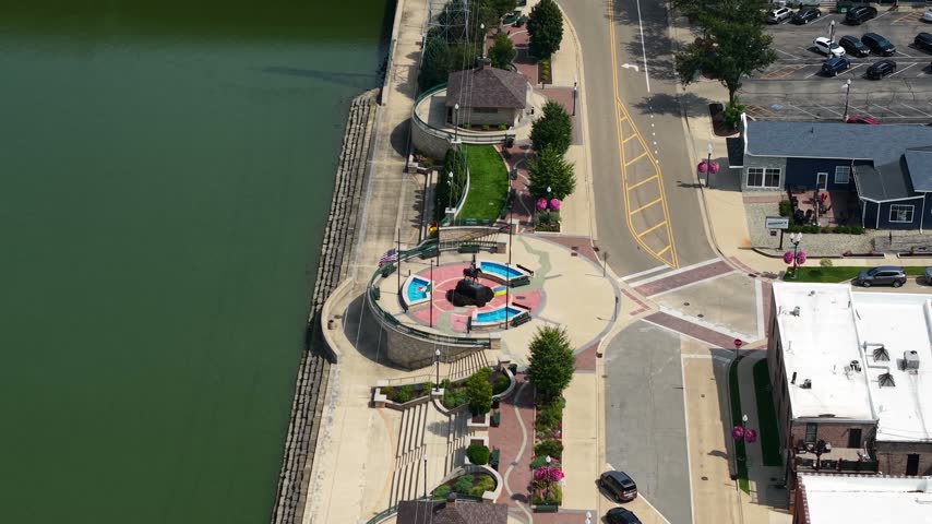 Dixon, Illinois USA. Drone View of Riverfront Park by Rock River on Sunny Summer Day