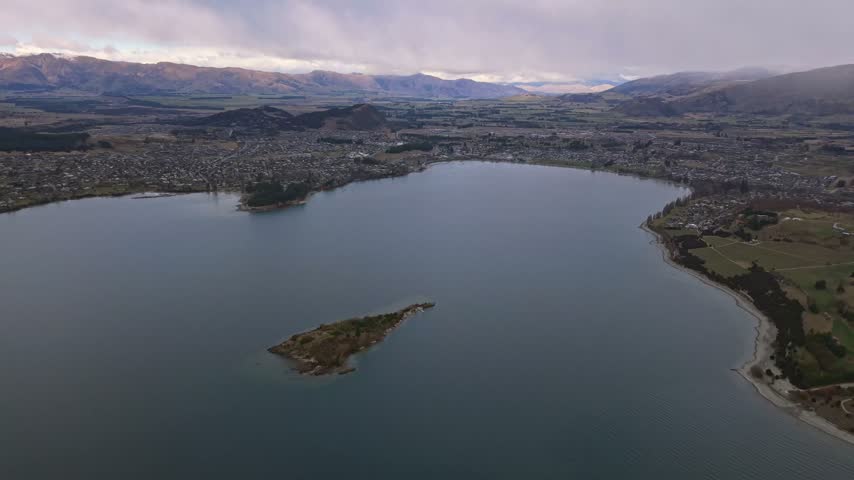 Aerial view of Lake Wanaka with Ruby Island and Wanaka township in the distance