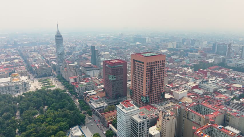Torre Latinoamericana rising above the Mexico City cityscape