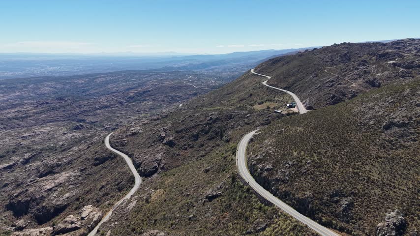 Aerial stock footage of Route 34 curves in Altas Cumbres mountains Cordoba