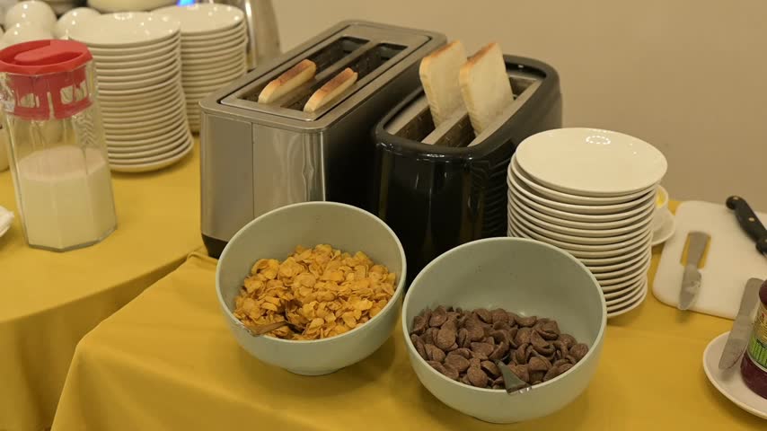 Breakfast Buffet Setup with Toaster Bread Cereals and Dining Table at Event Venue in Mumbai Maharashtra India September 21 2026
