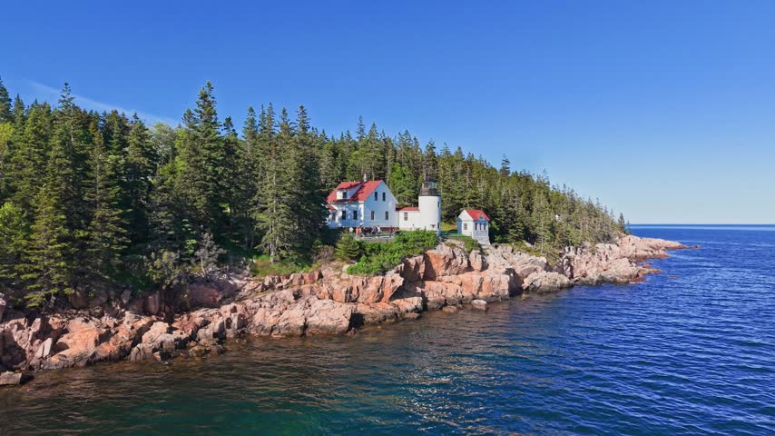 Aerial view of Bass Harbor Head Lighthouse and keeper