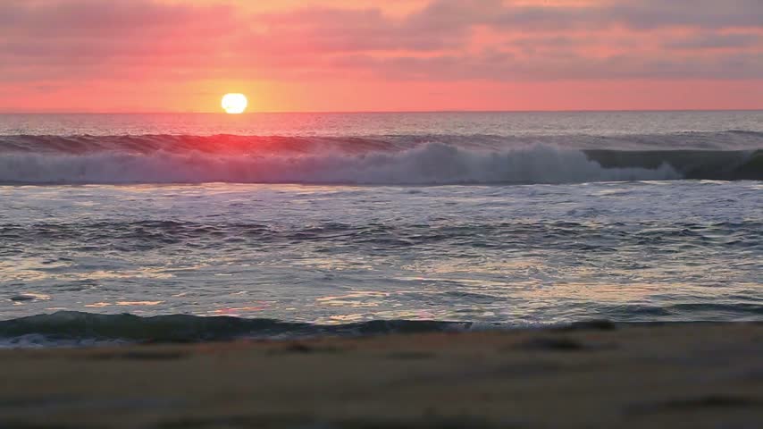 The sun rising over the Atlantic ocean at Assateague Island National Seashore, Maryland