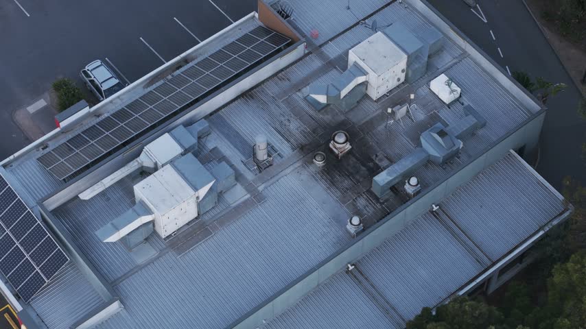 Top-down view of a fire on a commercial building