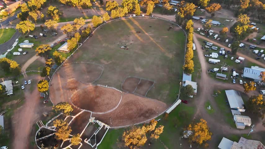 High angle aerial shot of a rural rodeo arena and showground in Coonabarabran, Australia.