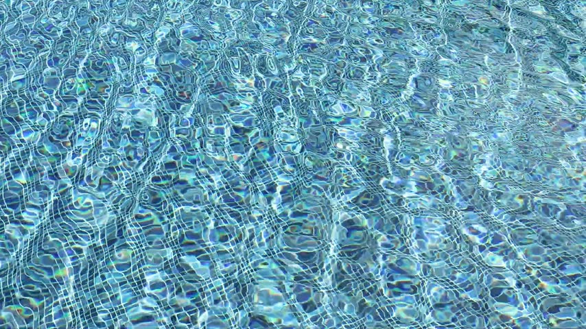 Swimming pool with blue crystal clear water surface and ripple wave background