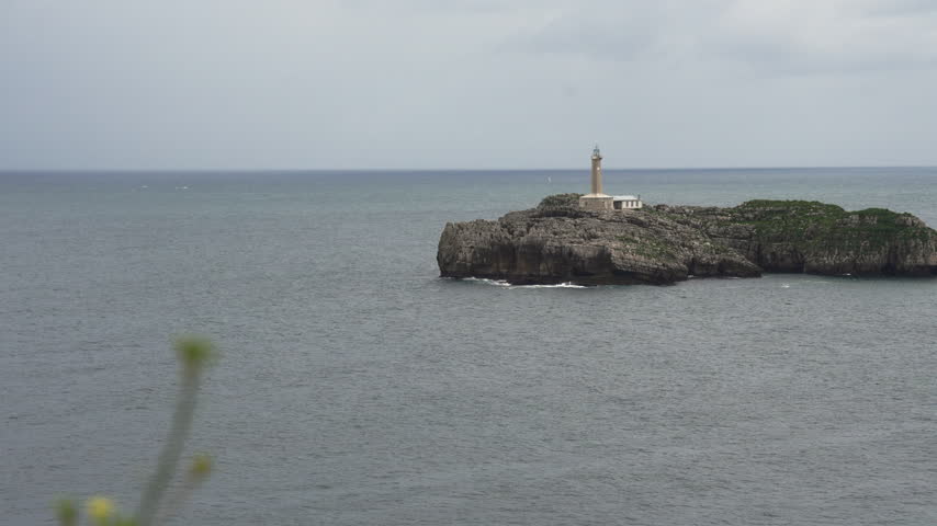 Scenic view of the Mouro Island lighthouse in Santander, Spain