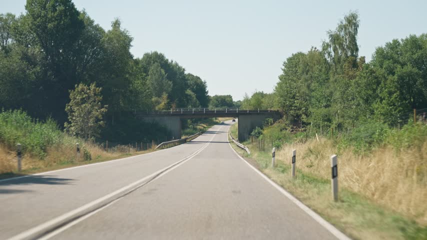 View of the road through the car