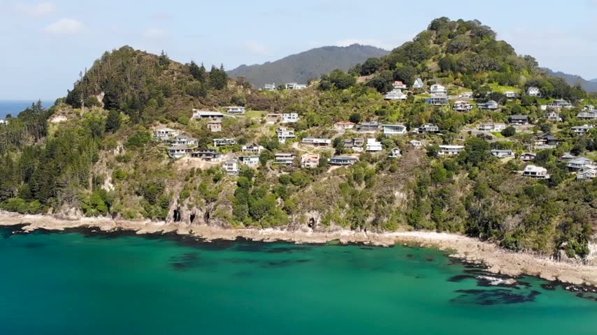 Aerial view of houses on Mount Paku in Tairua, Coromandel. New Zealand coastal scenery.