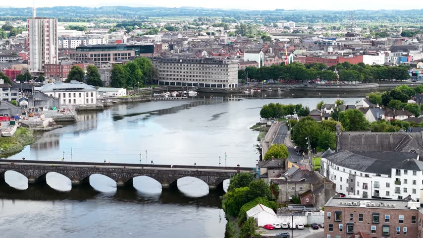 Limerick city panorama over the river with old bridge and castle to city centre. Ireland