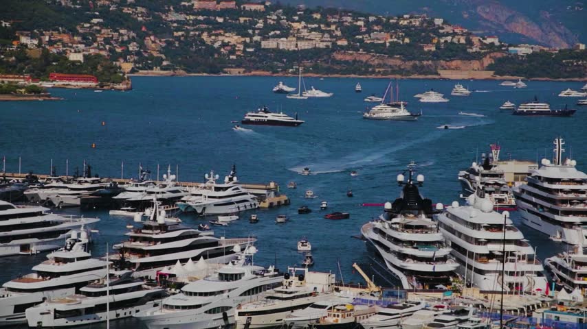 Boats and yachts in the Monaco harbour, during the summer