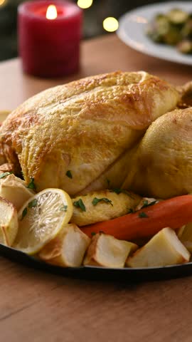 Traditional Christmas roast turkey with potatoes and festive side dishes