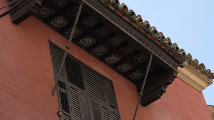 Building facade on a tourist street in Seville Spain