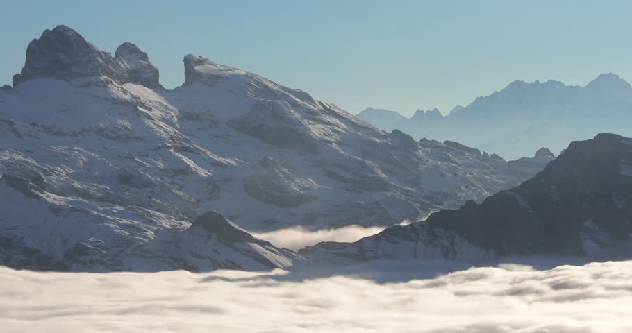 Foggy Mountain Peaks in the Alps