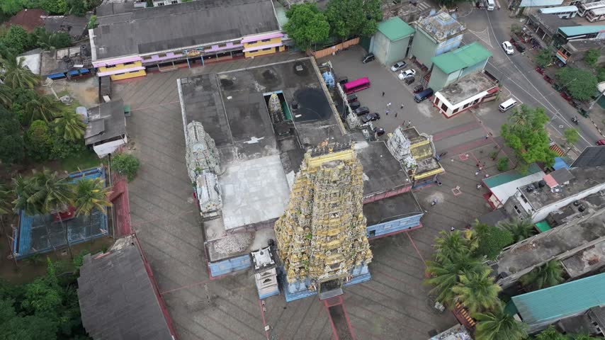 Aerial view of the ornate Sri Muthumariamman Temple with its colorful gopuram and courtyard in Kandy, Central Province, Sri Lanka.