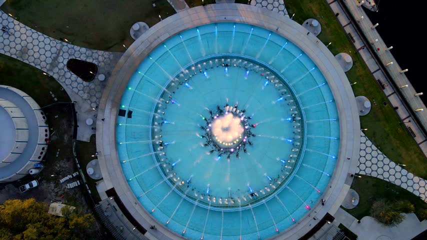  Drone holds above Friendship Fountain while showing the turquoise basin and water jets in Jacksonville.