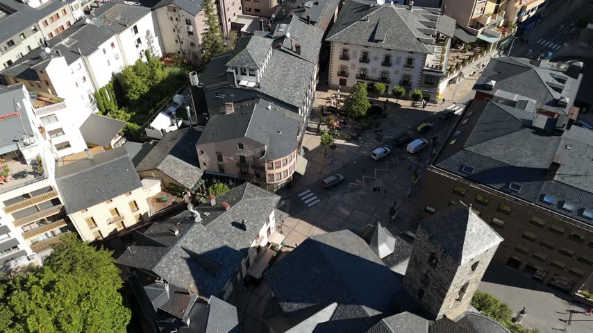 Aerial view of historic town square with slate-roofed buildings and narrow streets in the heart of the city, Andorra la Vella, Andorra la Vella, Andorra.