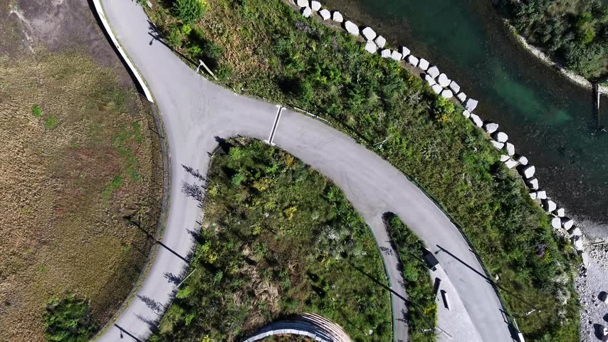 Top-down aerial of wetland islands and winding park paths, Toronto waterfront