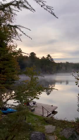 Peaceful autumn lake and forest in Algonquin Provincial Park, Ontario.