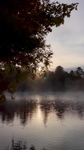 Misty autumn lake in Algonquin Provincial Park, Ontario, Canada.